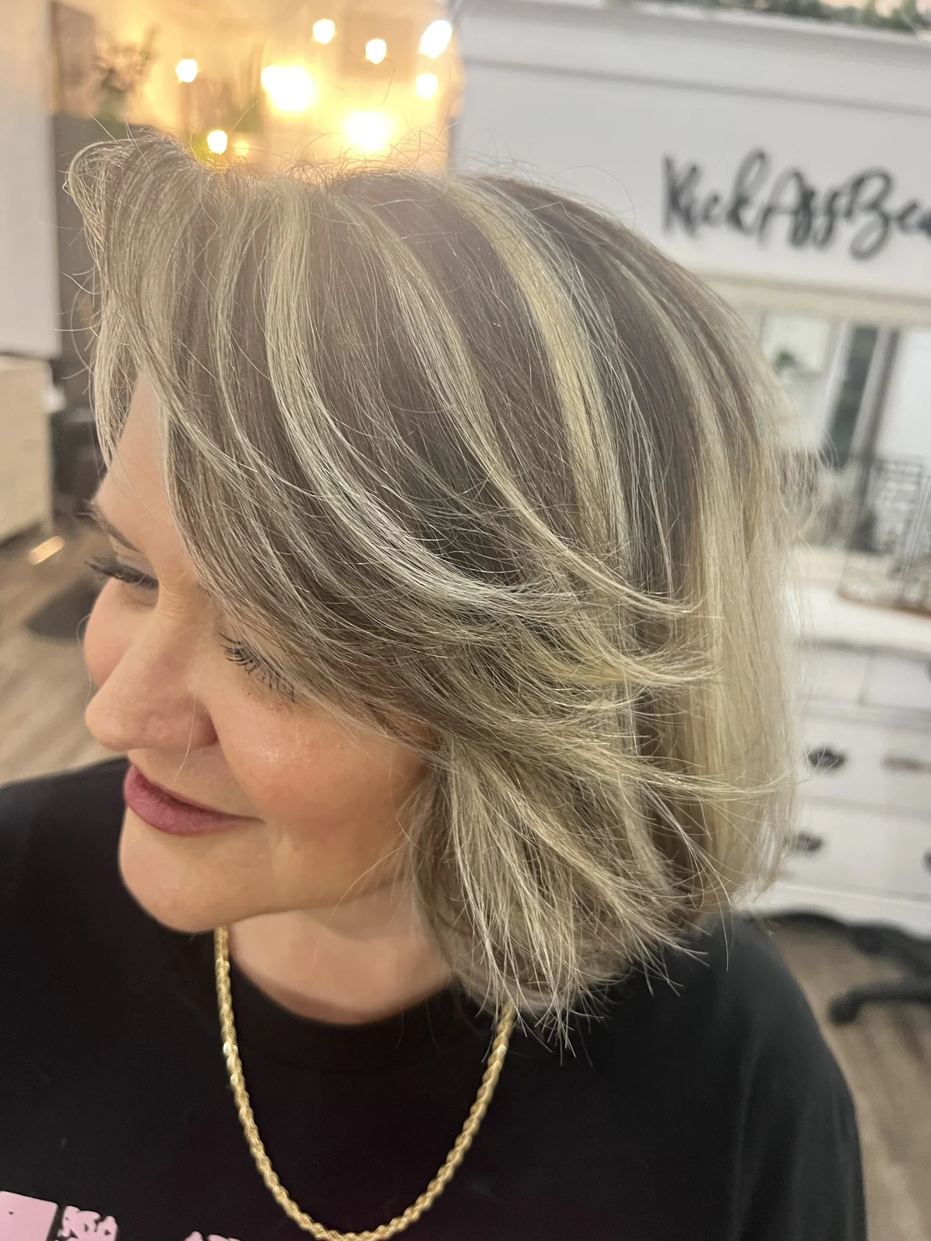 A softly shaped shoulder-length hairstyle by Kelley